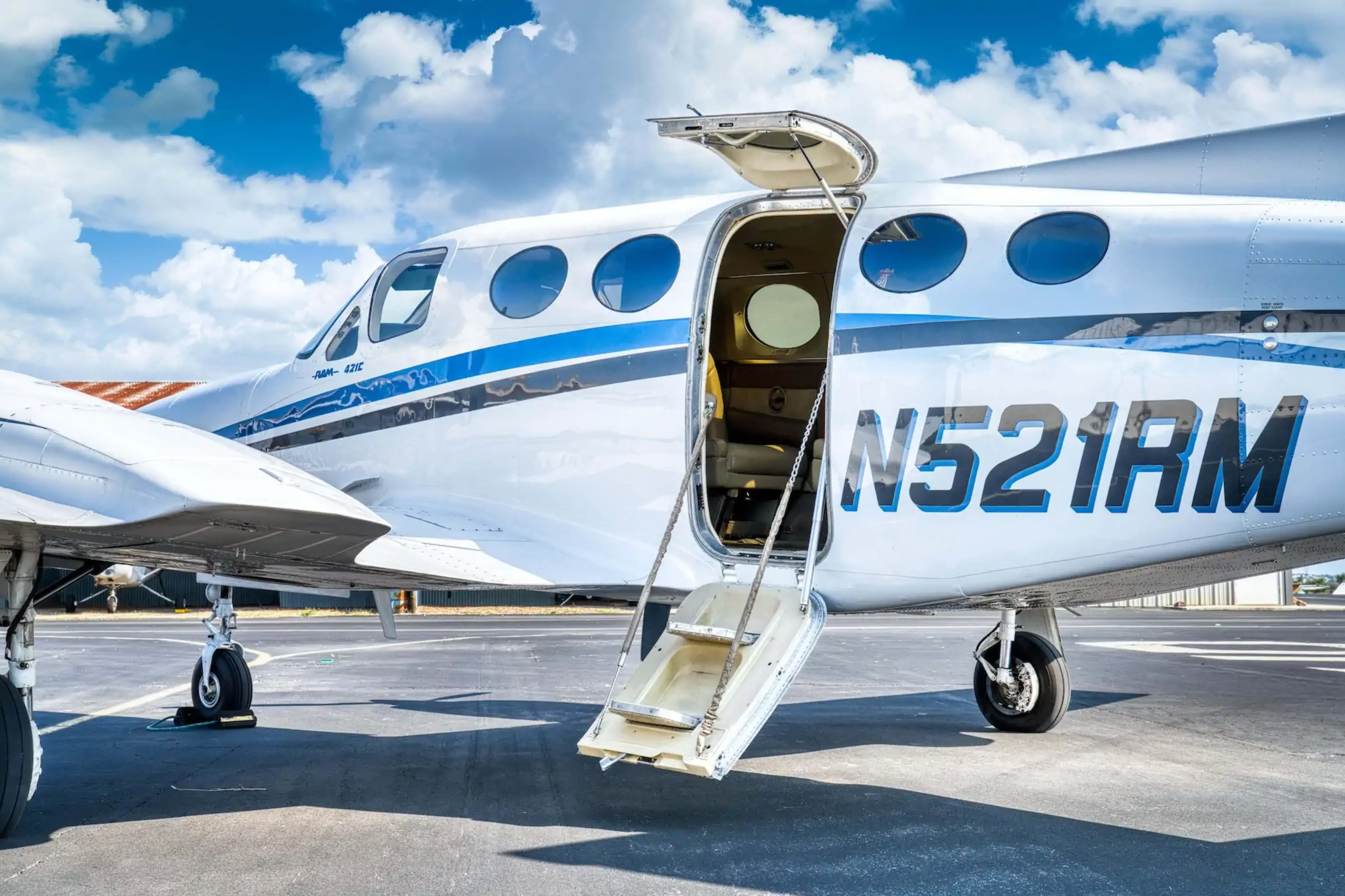 Cessna 421 with cabin door open